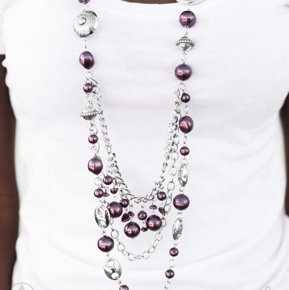long purple multi strand pearl necklace with purple ribbon